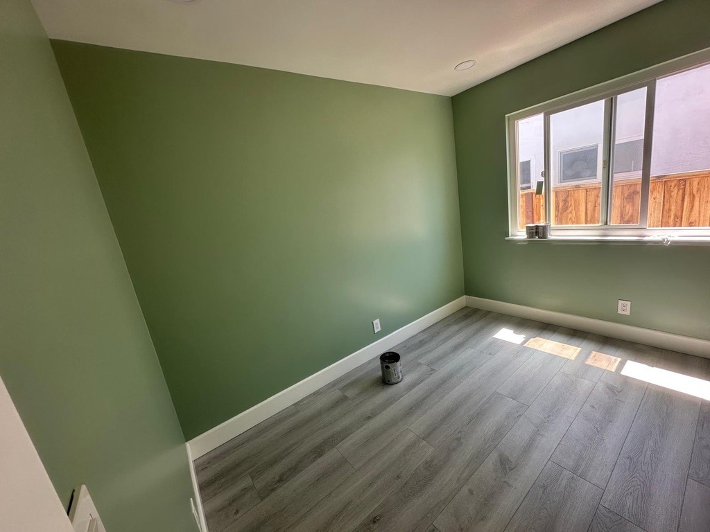 Interior room freshly painted in sage green by Silicon Prime Painting